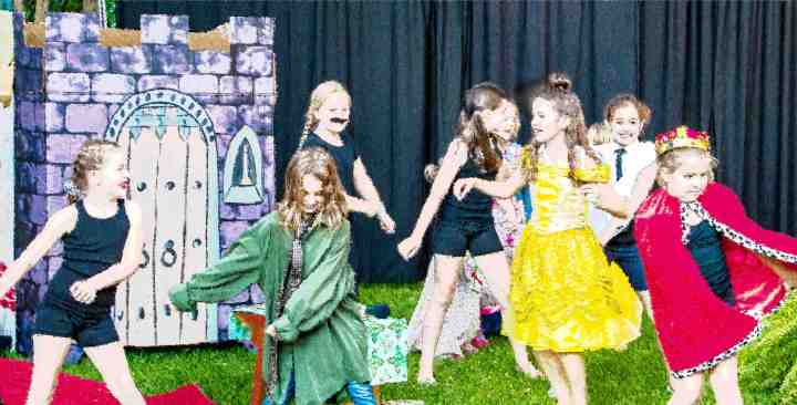 Cast dancing at end of play